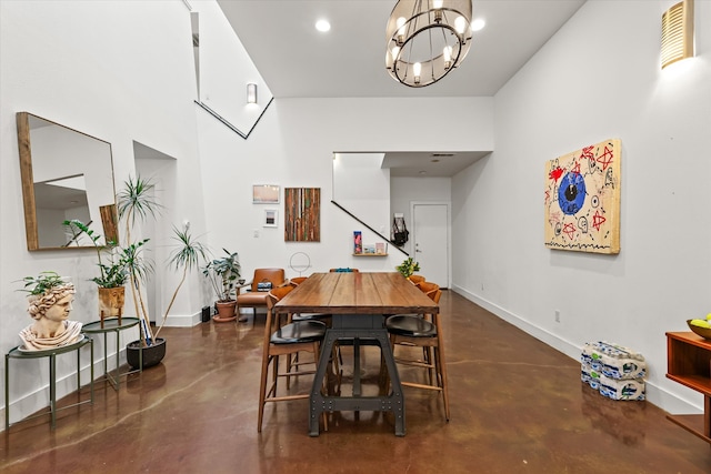 dining space with a notable chandelier