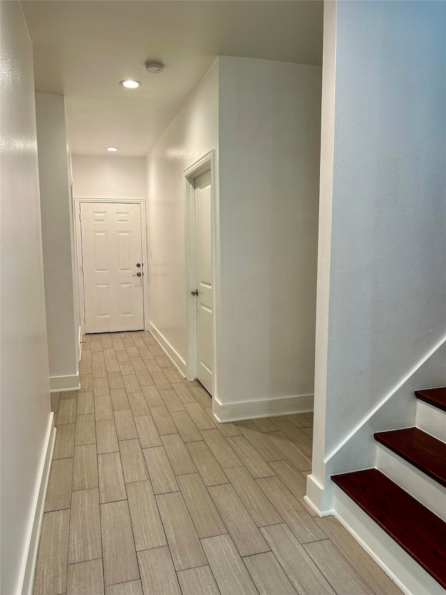 hallway featuring light wood-type flooring