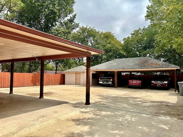 view of parking / parking lot with a carport