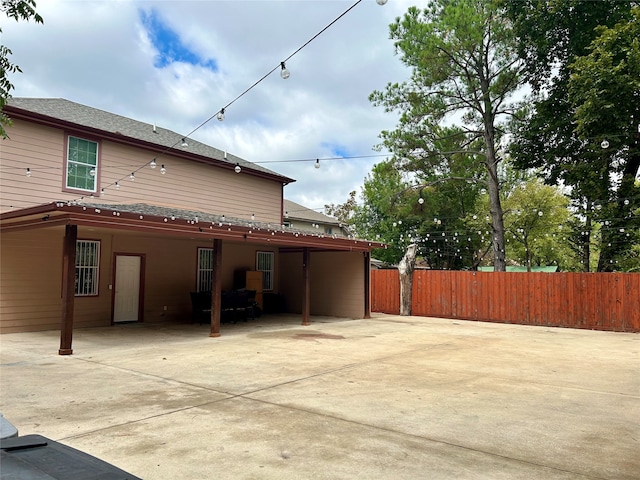 view of home's exterior featuring a carport