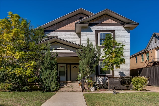 view of front of home with a front lawn