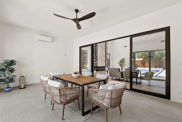 dining area with ceiling fan and a wall mounted AC