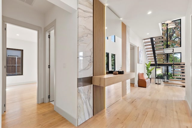 corridor featuring light hardwood / wood-style flooring