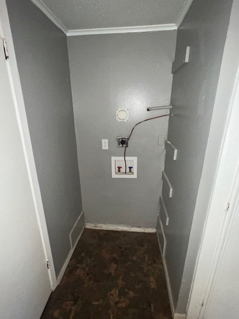 laundry area featuring hookup for an electric dryer, ornamental molding, and hookup for a washing machine