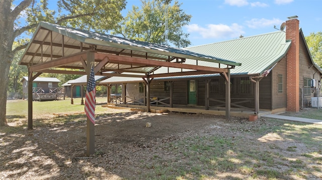 exterior space featuring an outbuilding