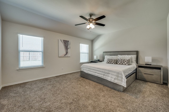 carpeted bedroom featuring vaulted ceiling and ceiling fan