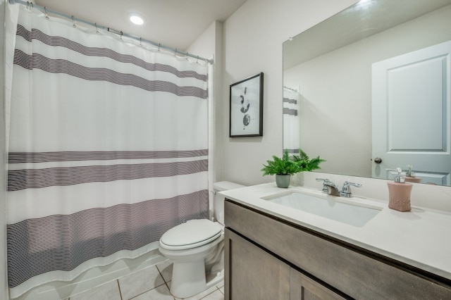 bathroom featuring vanity, tile patterned flooring, toilet, and a shower with shower curtain