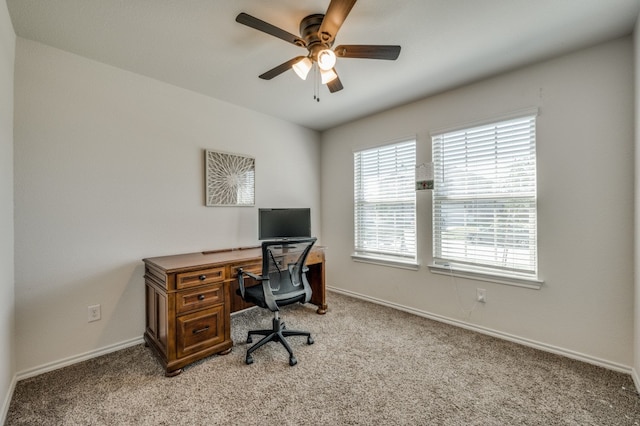 office area with light carpet and ceiling fan