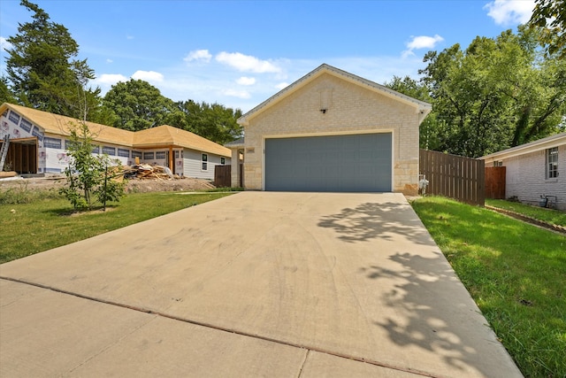 ranch-style home featuring a front yard