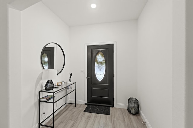 entrance foyer with light wood-type flooring