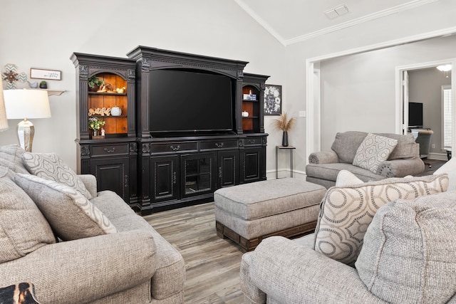 living room featuring light hardwood / wood-style flooring, high vaulted ceiling, and crown molding