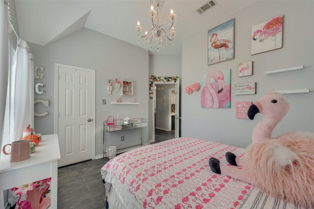 bedroom with a notable chandelier, vaulted ceiling, and dark hardwood / wood-style flooring