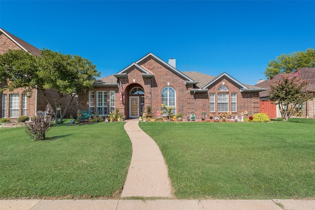 view of front of house with a front lawn