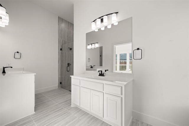 bathroom with vanity and walk in shower