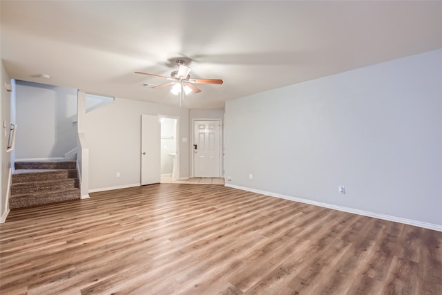 interior space with ceiling fan and hardwood / wood-style floors