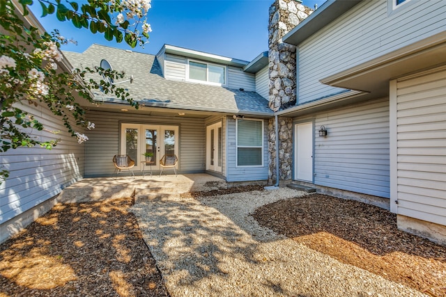 property entrance with french doors and a patio