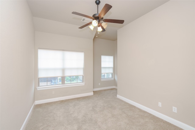 carpeted empty room with ceiling fan