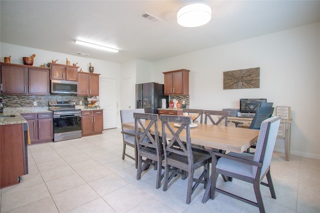 view of tiled dining space