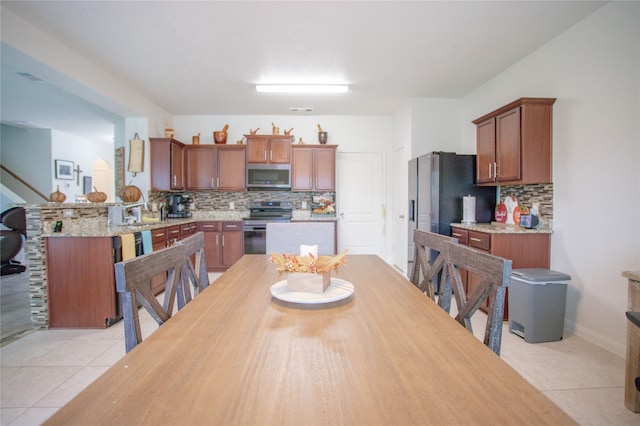 view of tiled dining area