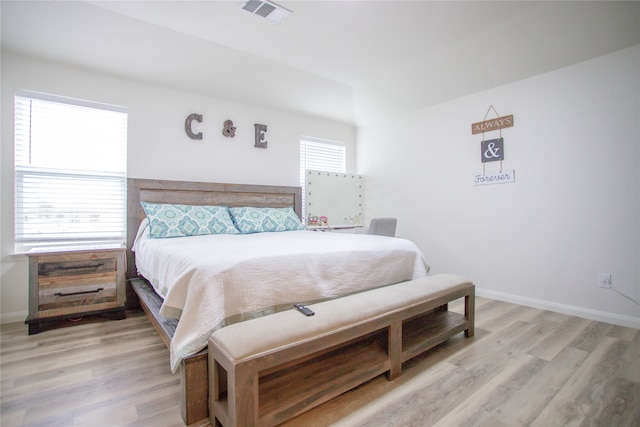 bedroom featuring light wood-type flooring