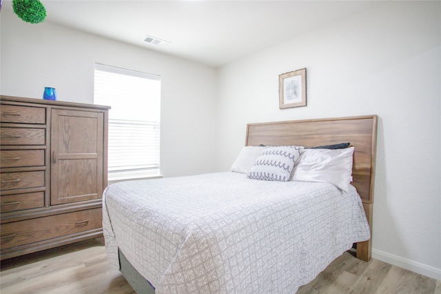 bedroom featuring light hardwood / wood-style flooring