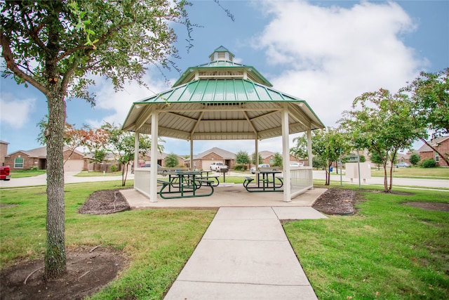 view of home's community featuring a gazebo and a yard