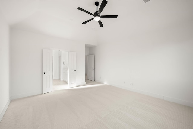 unfurnished bedroom featuring light carpet and ceiling fan