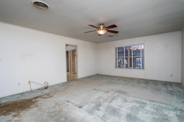 unfurnished room featuring carpet flooring and ceiling fan