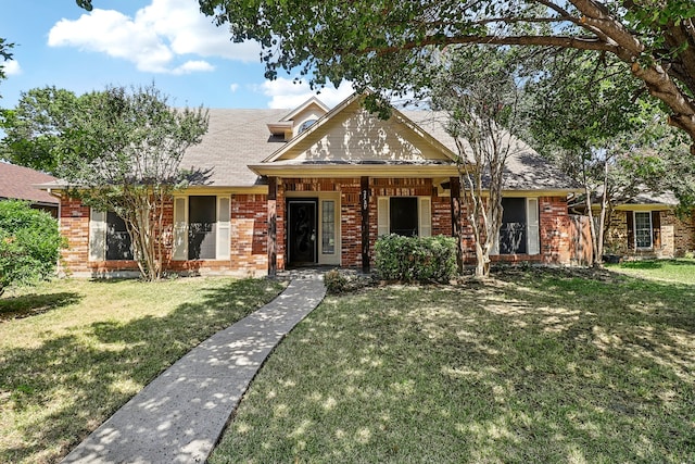 view of front of house with a front lawn