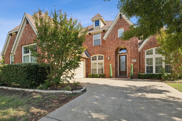 tudor home with a garage