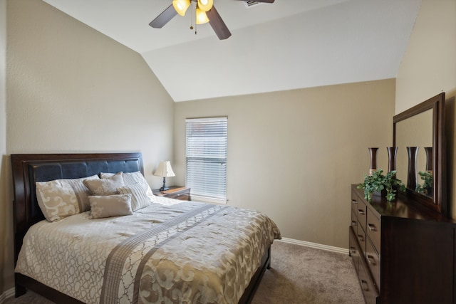 carpeted bedroom featuring ceiling fan and lofted ceiling