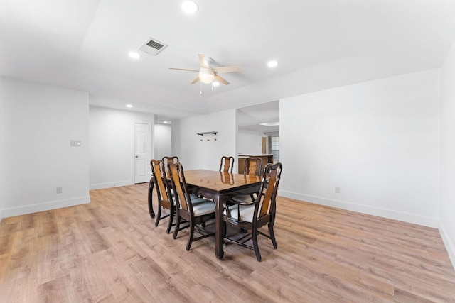 dining room featuring light wood-type flooring and ceiling fan