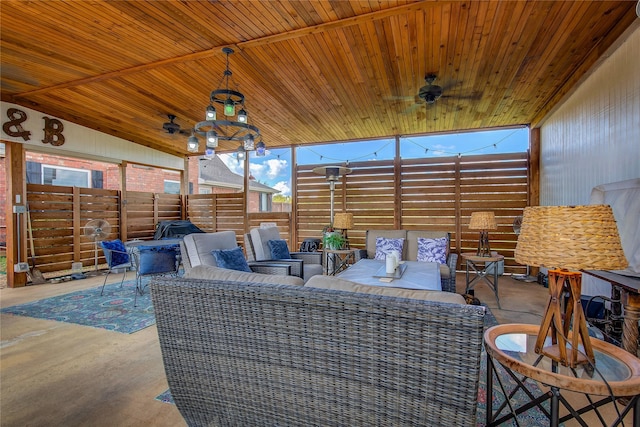 view of patio / terrace featuring a ceiling fan, fence, and an outdoor living space