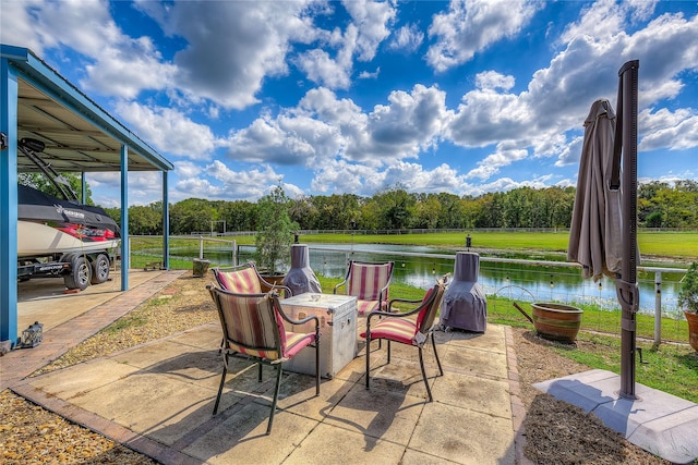 view of patio / terrace with a water view