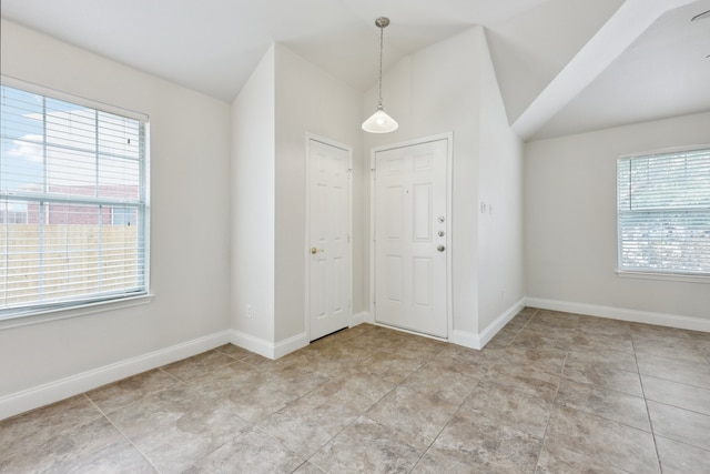 foyer with plenty of natural light