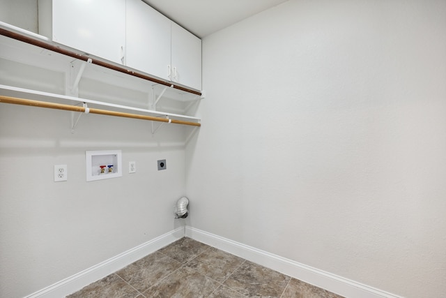 laundry room with washer hookup, cabinets, and electric dryer hookup