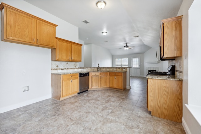 kitchen featuring dishwasher, ceiling fan, vaulted ceiling, and light stone counters