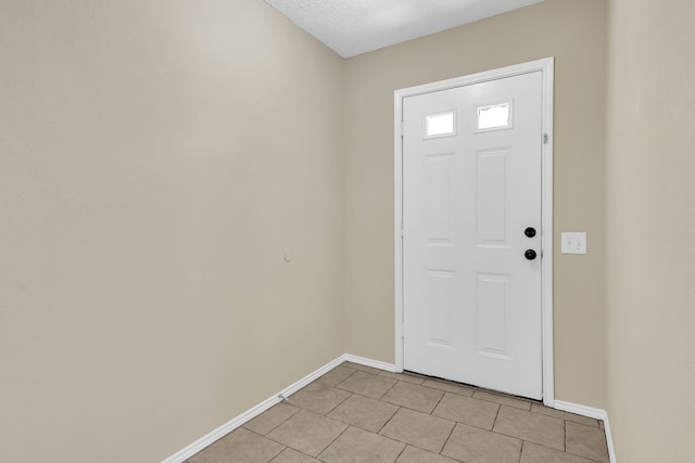 4629 Grant Park Ave, Fort Worth, TX 76137 - entryway featuring light tile patterned floors and baseboards