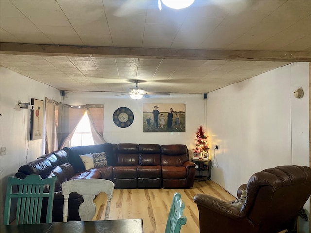 living room with hardwood / wood-style floors and ceiling fan