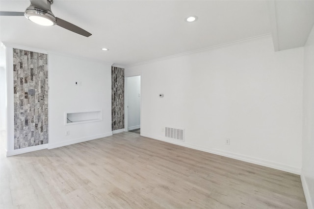 kitchen featuring white cabinets, sink, decorative light fixtures, light hardwood / wood-style floors, and light stone counters