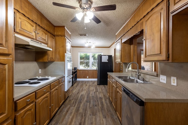 kitchen featuring sink, white appliances, dark hardwood / wood-style flooring, ornamental molding, and ceiling fan