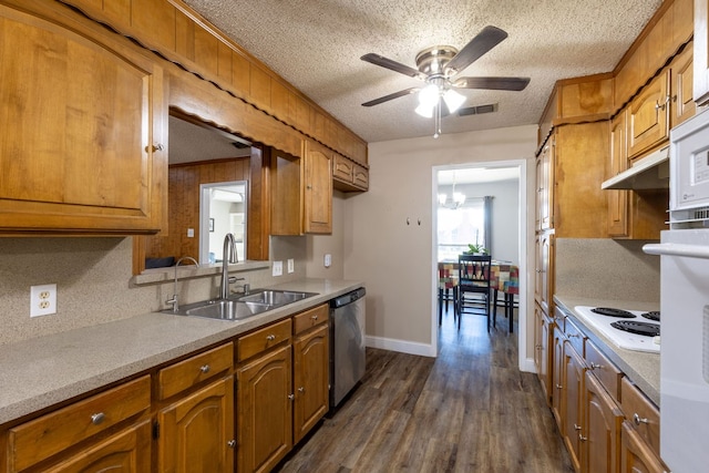 kitchen featuring dark hardwood / wood-style floors, sink, ceiling fan with notable chandelier, white cooktop, and stainless steel dishwasher