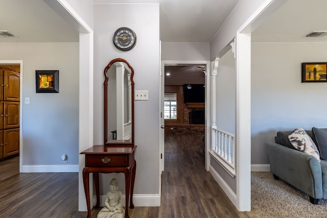 hallway featuring dark wood-type flooring