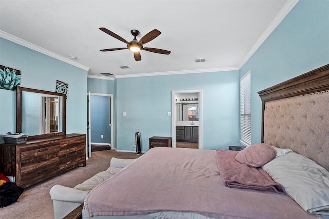 bedroom with ornamental molding, carpet floors, ceiling fan, and connected bathroom