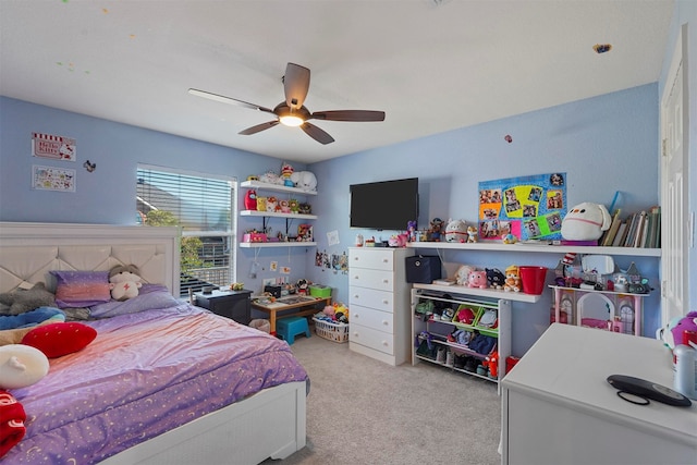 bedroom with ceiling fan and light colored carpet