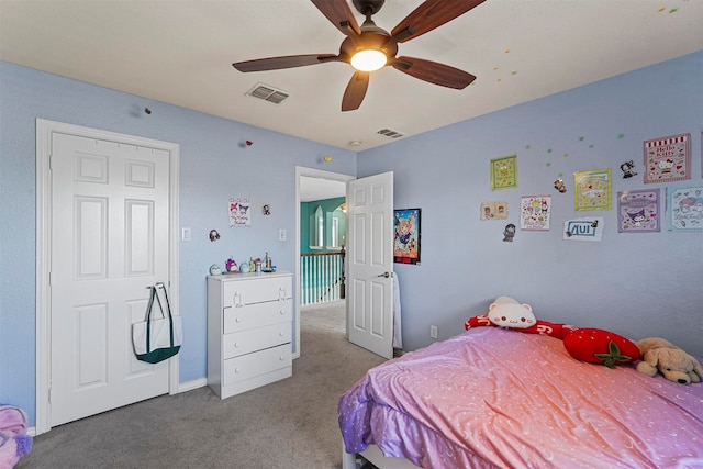 carpeted bedroom with ceiling fan