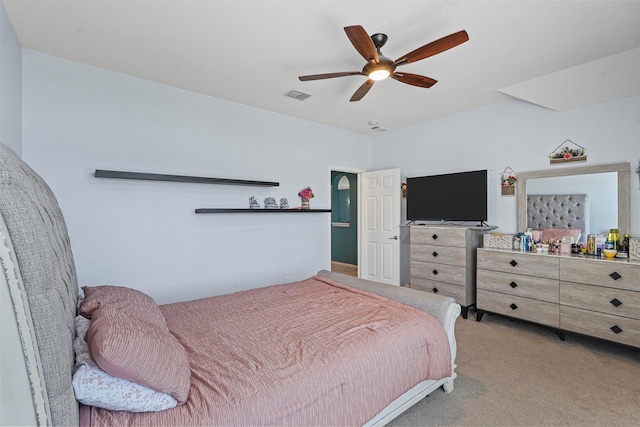 bedroom featuring ceiling fan and carpet floors