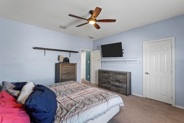 carpeted bedroom with ceiling fan