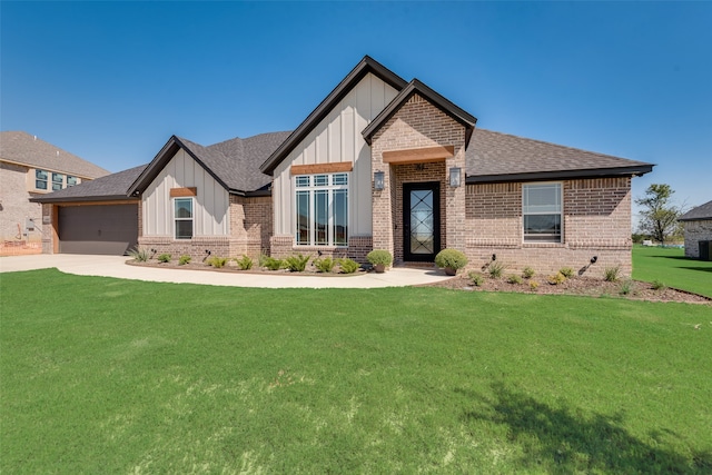 view of front facade with a front lawn and a garage