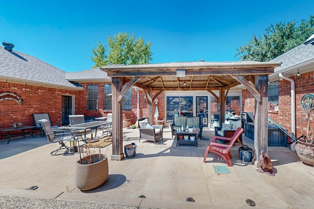 view of patio / terrace with an outdoor hangout area and a gazebo